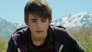 Charlie Rowe in 2013's Walking With Dinosaurs